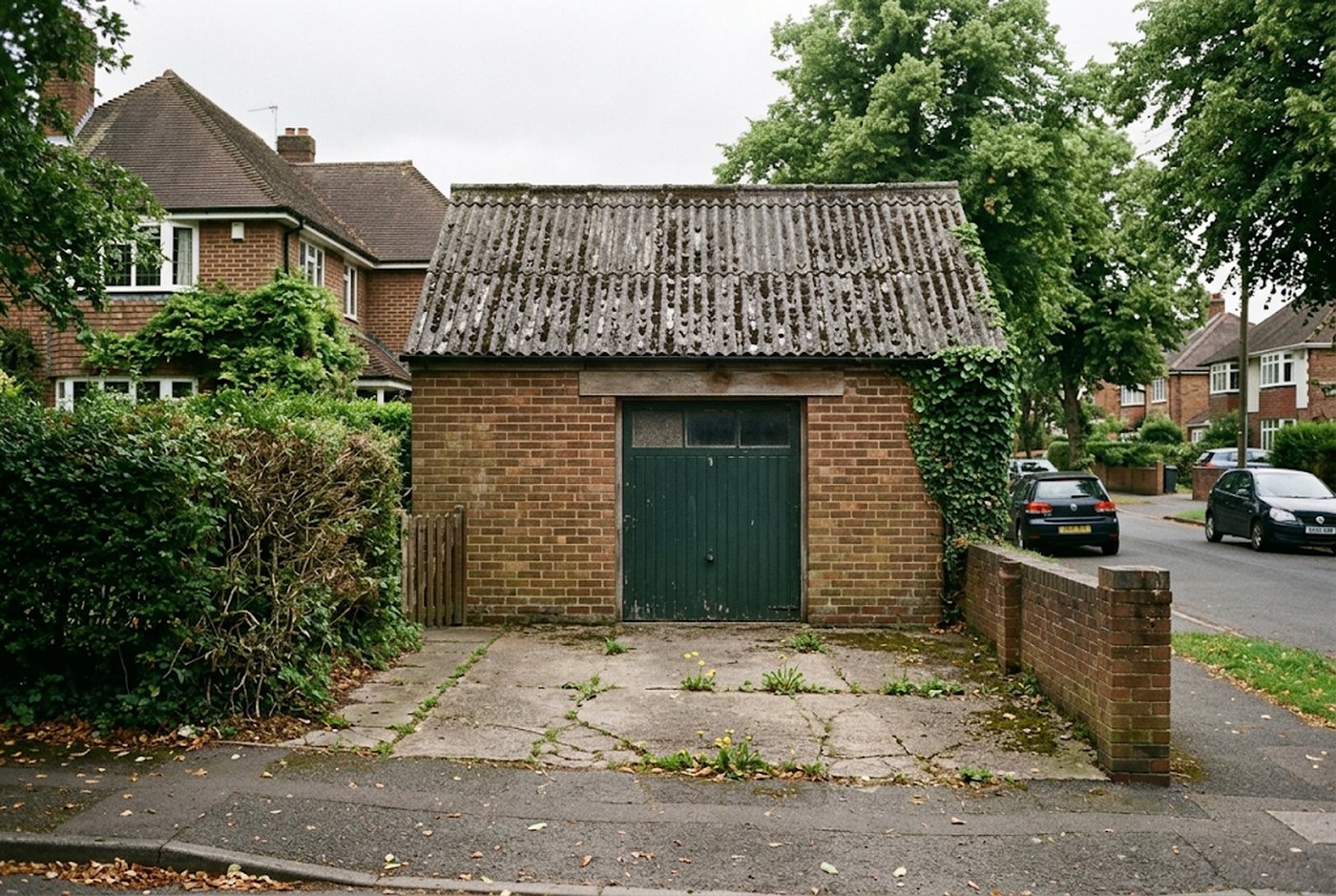 Old outbuilding with a weathered corrugated asbestos cement roof